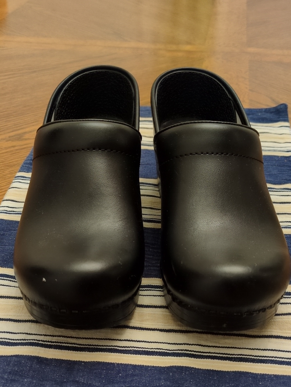 Dansko Black Slip-On Clogs